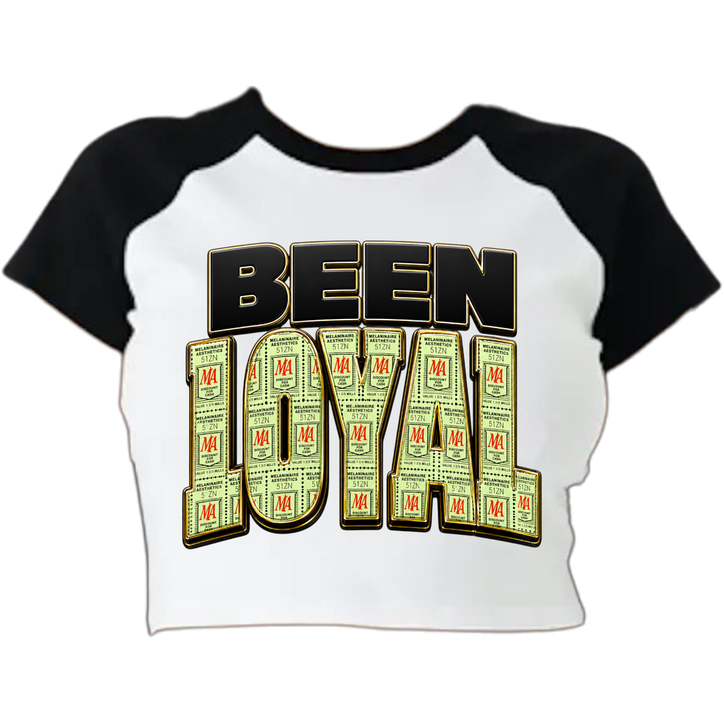 If you remember saving Green Stamps, you already know the assignment. You didn't throw them away... you stacked them. BEEN LOYAL is a tribute to the generation that earned everything, stayed solid, and understood that loyalty was worth more than likes. Featuring a nostalgic Green Stamps-inspired design with a MELANINaire Aesthetics twist, this tee celebrates old-school values, hard work, and memories that never expire.

Printed on a premium District Unisex Tee in classic Black, this shirt is built for those