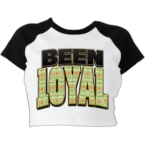 If you remember saving Green Stamps, you already know the assignment. You didn't throw them away... you stacked them. BEEN LOYAL is a tribute to the generation that earned everything, stayed solid, and understood that loyalty was worth more than likes. Featuring a nostalgic Green Stamps-inspired design with a MELANINaire Aesthetics twist, this tee celebrates old-school values, hard work, and memories that never expire.

Printed on a premium District Unisex Tee in classic Black, this shirt is built for those